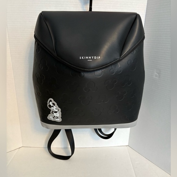 Disney Handbags - NWT DISNEY skinnydip London steamboat Willie Mickey backpack